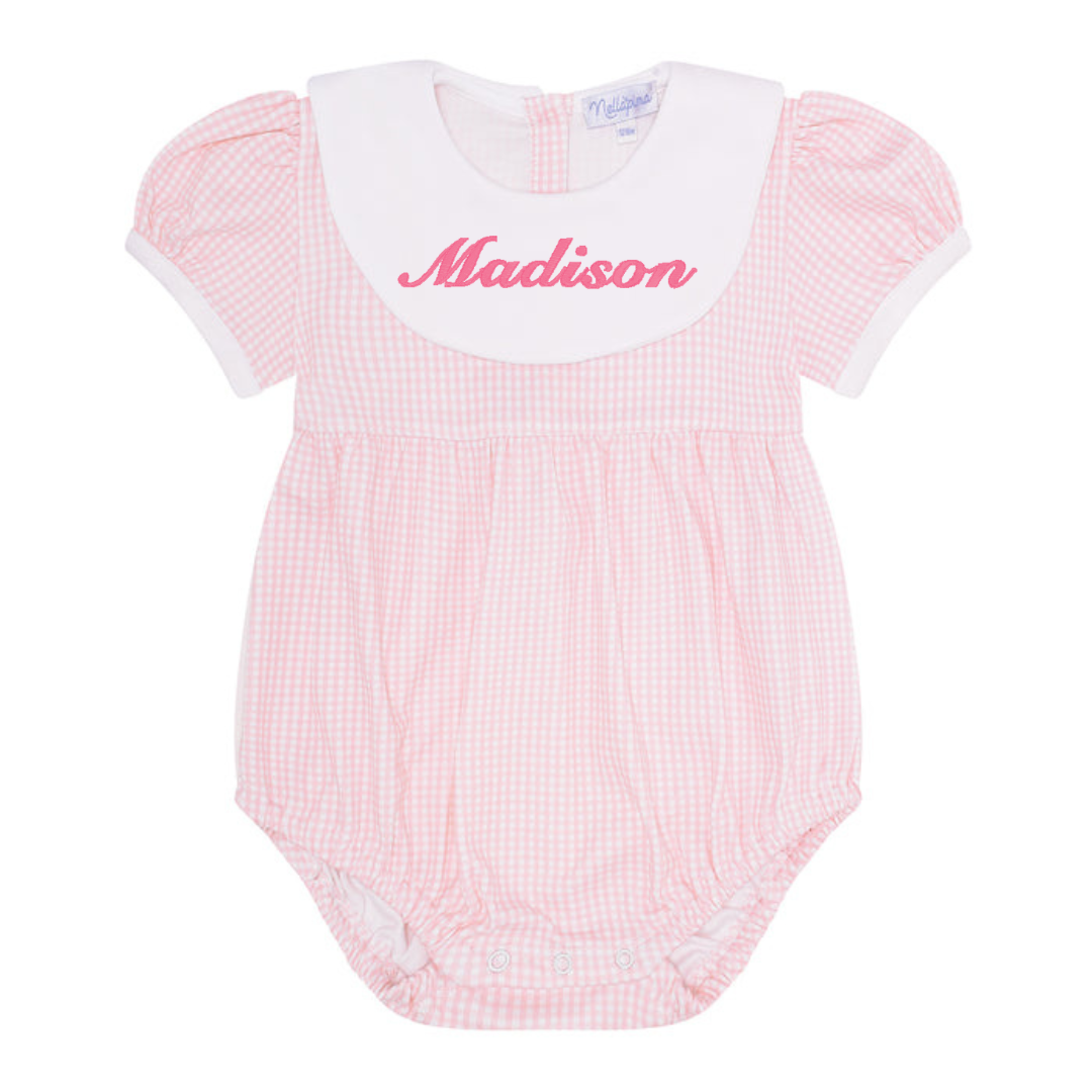 The Pink Gingham Baby Bubble is an instant favorite with its classic pink pastel color and elegant white collar. Made&nbsp;of 100% Pima cotton, this baby bubble provides endless comfort for your little one. The&nbsp;Gingham Collection is a babywear collection that showcases how less is often more.