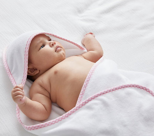 Our hooded towel set is made of extra soft, pure cotton terry for newborn’s sensitive skin. The towel is so large that it can last well into the toddler years. The hood is covered with a pique layer, which helps to hold a monogram beautifully and is backed with terry cloth for extra absorbency.