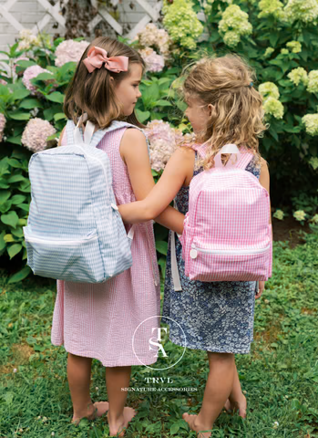 This TRVL Backpacker is made from lightweight and water-resistant coated cotton. Two way main zipper with ample room for all your kids things and when it gets dirty you can just toss it in the wash! (see care instructions) It features two padded straps, front zipper pocket, top carrying handle and two water bottle side pockets